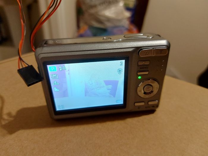 PENTAX 7 Megapixels Digital Camera, takes 2 AA Batterys, works fine, in very good cosmetic condition