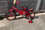 Red Kids bicycle for collection