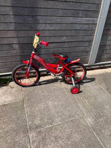 Red Kids bicycle for collection