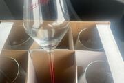 6 Smirnoff Glasses.