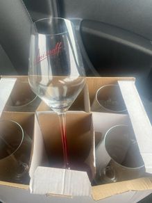 6 Smirnoff Glasses.