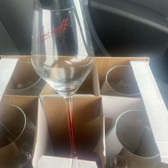 6 Smirnoff Glasses.