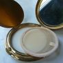 A Collection of Mid-Century Compacts. Tallent Enamel, Kigu, a Courting Couple Novelty Piece and a Henriette Pocket-Watch Compact Image 6
