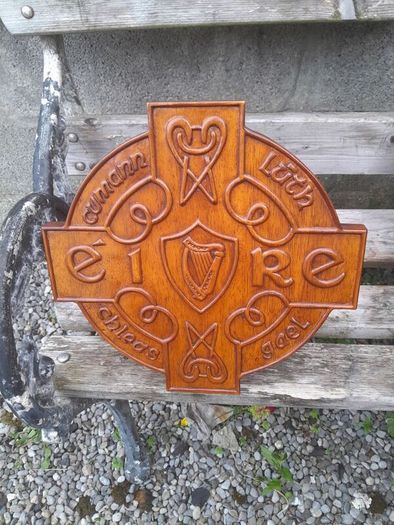 carved g.aa.a shield