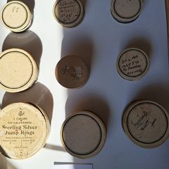 Lot of Antique Watch Parts in Containers