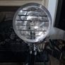 The Nautical is a large floor lamp with a tripod design Image 6