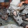 Porcelain Figurine of Seated Elderly Man with Birds Image 3