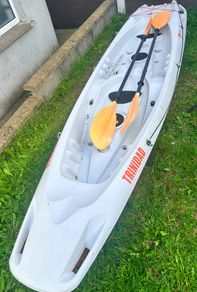 2+1 family sit on kayak