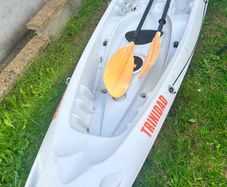 2+1 family sit on kayak