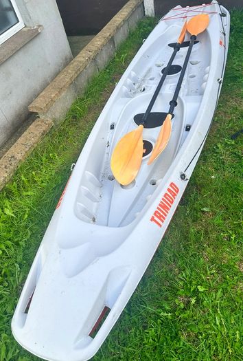 2+1 family sit on kayak