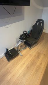 Racing sim with wheel,pedals and seat