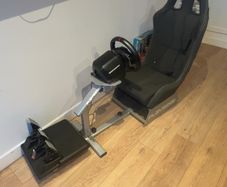 Racing sim with wheel,pedals and seat