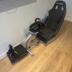 Racing sim with wheel,pedals and seat