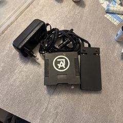 Power supply for a tattoo machine with a foot pedal.