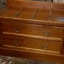 Chest with suitcase set down on top Image 5