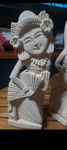sandstone bookends/statues