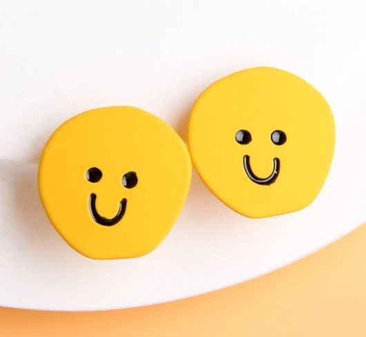 Yellow ear cuffs