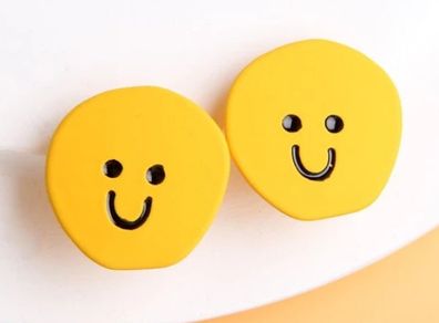 Yellow ear cuffs