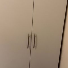 Grey wadrobe with silver handles