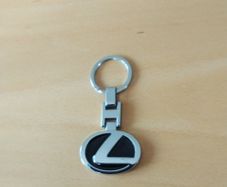 Brand New Lexus Keyring with double sided logo .