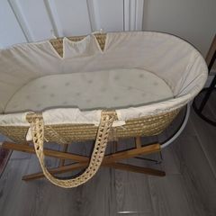 moses basket with a stand