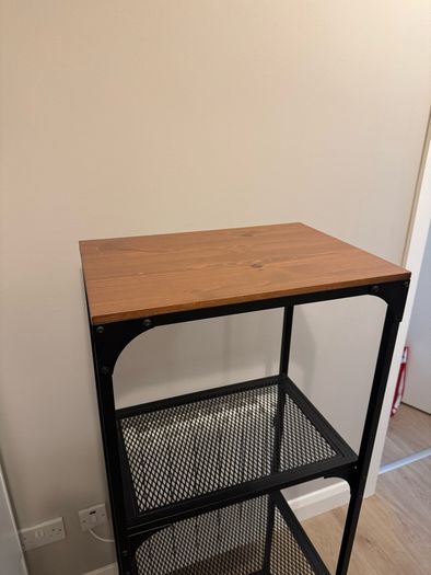 Rustic shelving unit, black metal and a wooden top. Beautiful and functional. Perfect conditions.
