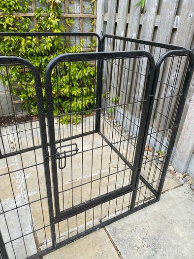 Black metal dog pen