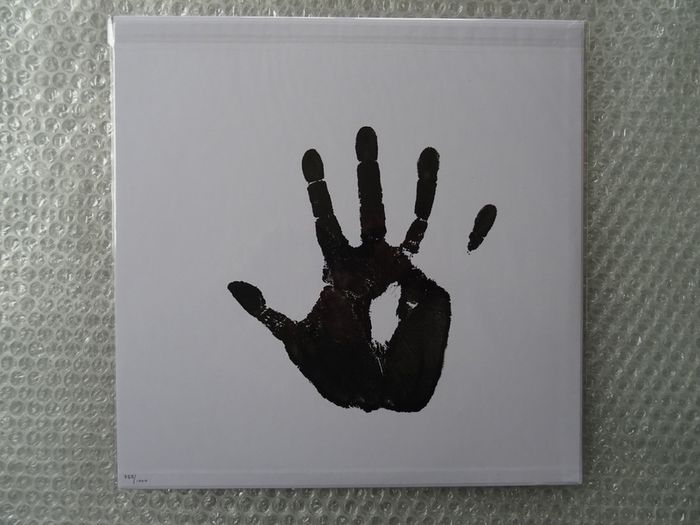 Art on vinyl sleeve by David Shrigley (Painting not print)