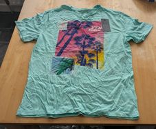 2 tagged Penny's tshirts in large for sale
