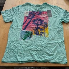 2 tagged Penny's tshirts in large for sale