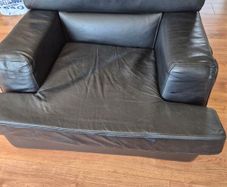 1 contempory leather sofa with arm chair