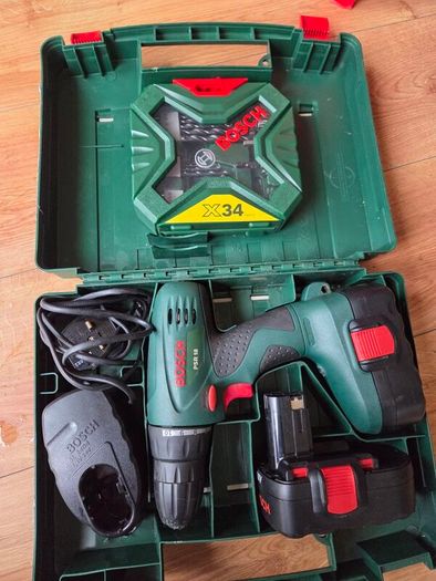 Bosch PSR 18 drill with 2 batteries, charger and brand new bits