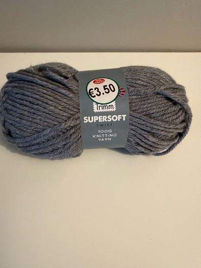 5 balls of grey yarn wool