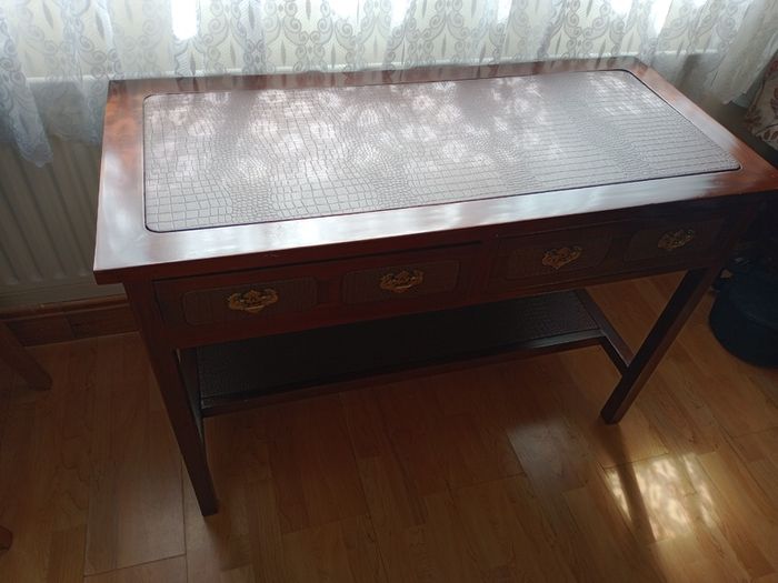 Wooden console table with faux crocodile skin detail