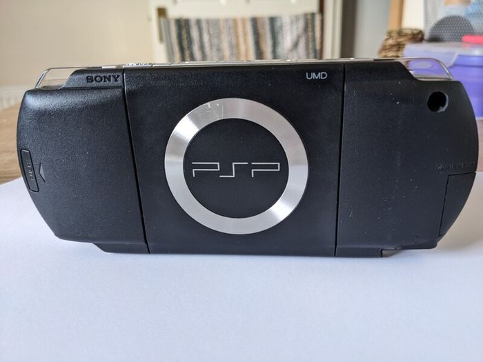 PSP original console with charger and battery