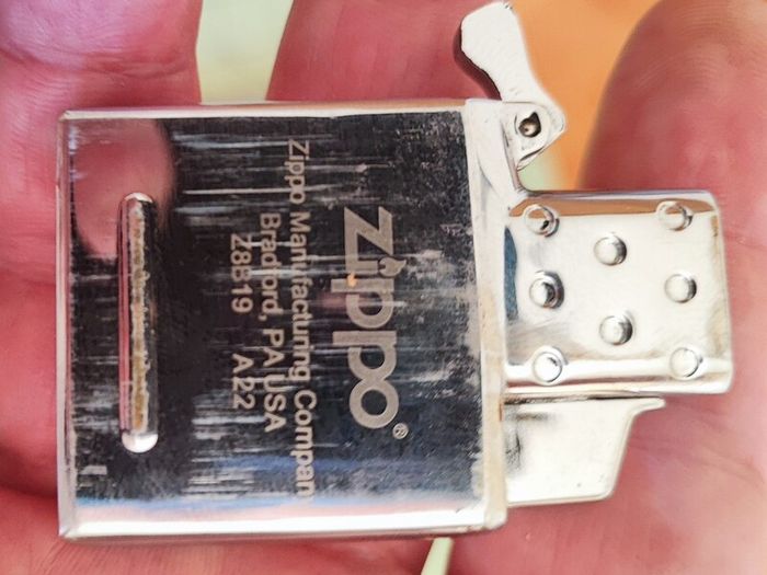 Old Zippos, Zippo flints, and a steel smokes case