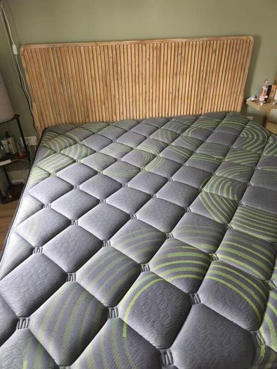 Super King mattress with wooden bed