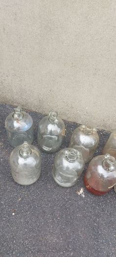 13 x demi johns,glass jars ,used condition, needs a clean,,buyer collects,,10 euros each or a deal  for the 13 ,sold as is