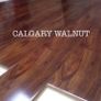 New 12mm High Gloss Calgary Walnut Flooring Image 3