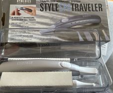 Portable, battery-operated manicure system designed for travel.