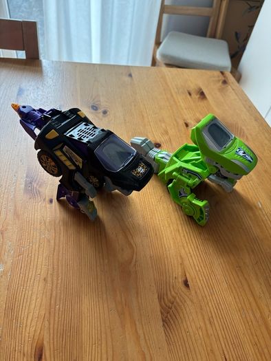 Two V-Tech Switch & Go Dinos