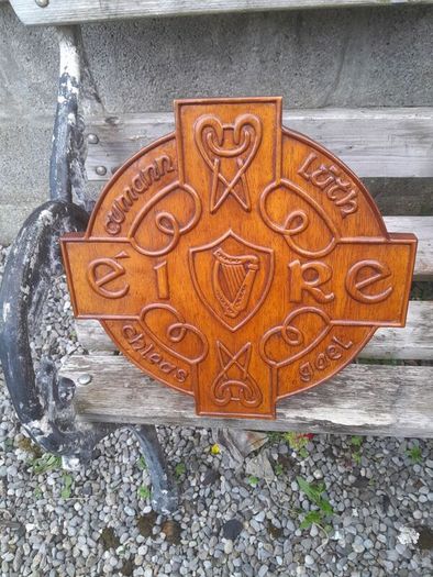 carved g.aa.a shield