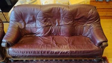 Free to collect: solid wood burgundy leather couches - 2 and 3 seater