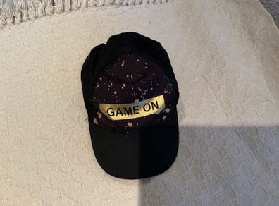 Game on Black Cap
