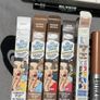 The balm tinted brow gel, clear brow gel, white, black eye pencils, liquid eyeliners Image 3