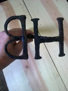 Old Irish blacksmith made branding iron with letters HB