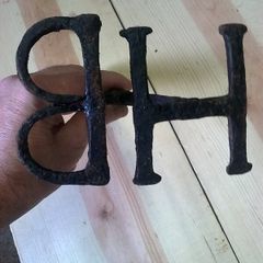 Old Irish blacksmith made branding iron with letters HB