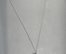 silver cow necklace