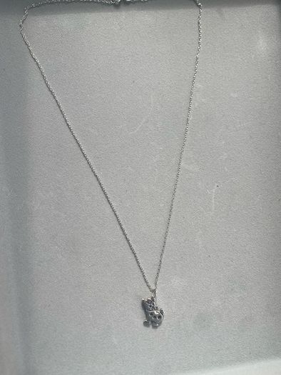 silver cow necklace
