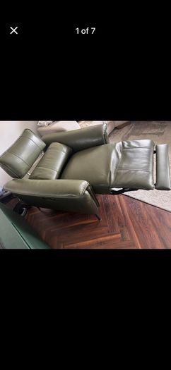 Olive green leather electric recliner armchair
